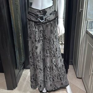 This pant is a one of a kind. Very funky grey and black ragged fabric.